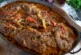 Крехък свински врат с чушки и лук на фурна